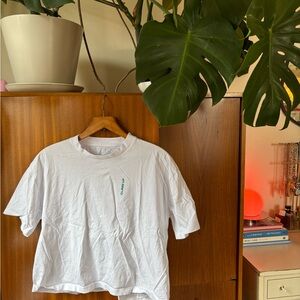 White Graphic Tee with Small Teal Climbing Gym Print